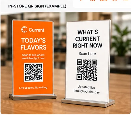 Two table-tent QR signs on a counter: an orange CurrentView-branded ‘Today’s Flavors’ sign and a white ‘What’s current right now’ sign